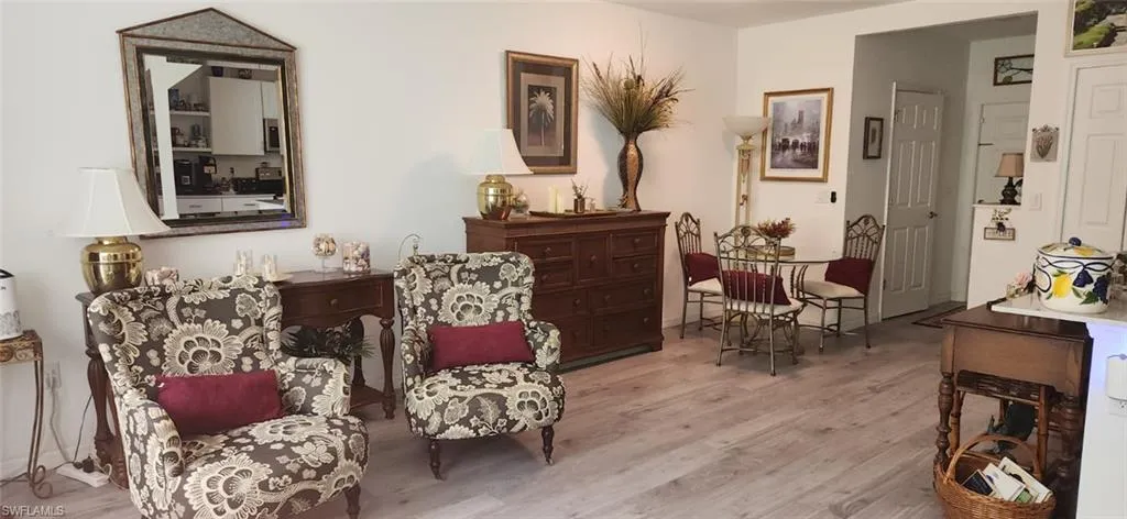 Living area with light wood-style floors