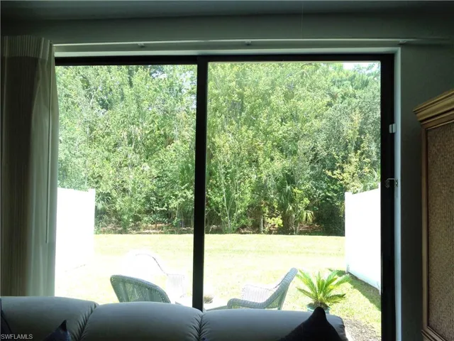 Doorway featuring plenty of natural light