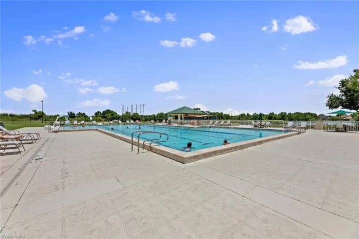 Community pool featuring a patio area