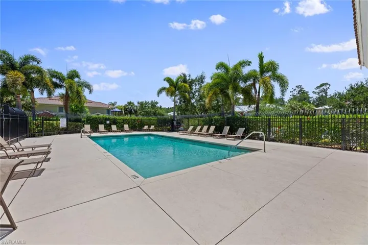 Community pool featuring a patio area