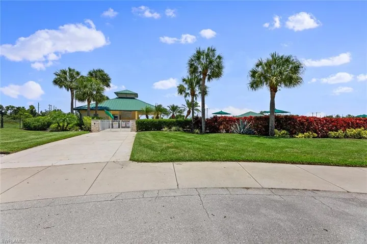 View of front facade with a front yard and a gazebo