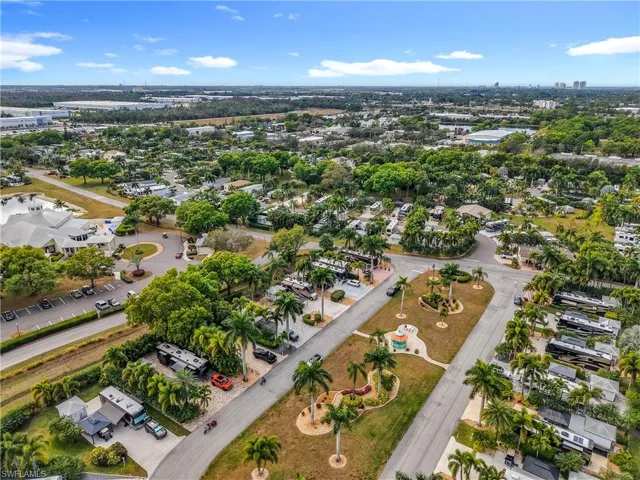 Aerial overview of property's location featuring nearby suburban area
