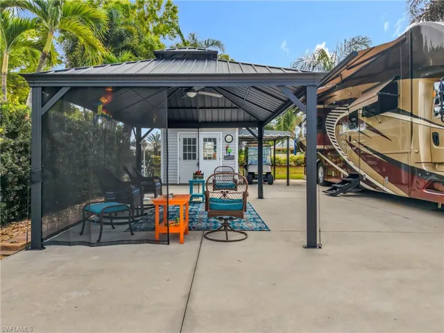 View of patio featuring a gazebo