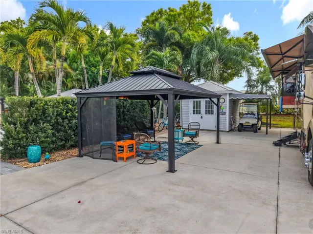 View of patio featuring a gazebo