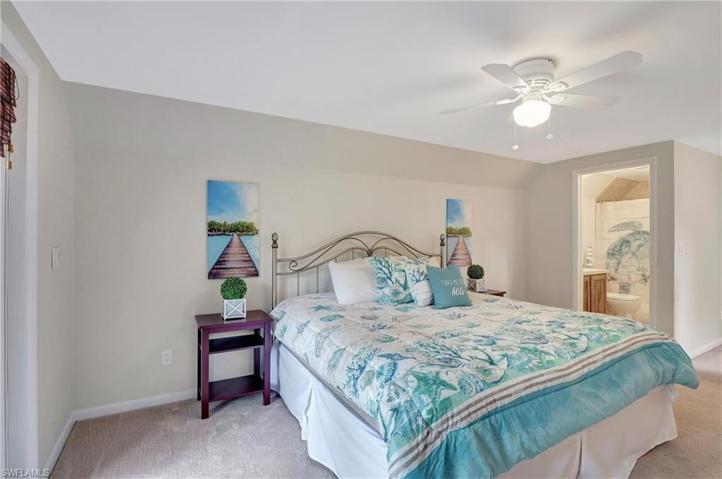 Primary bedroom W/screened in balcony