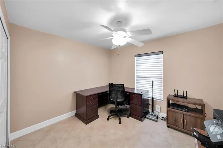 Tiled office with ceiling fan