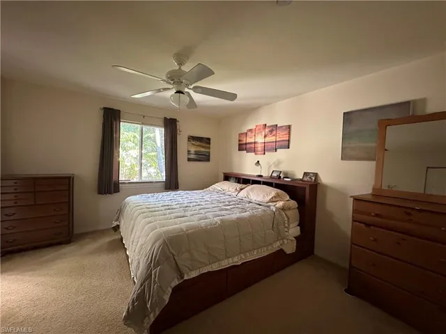 Master Bedroom with carpet flooring