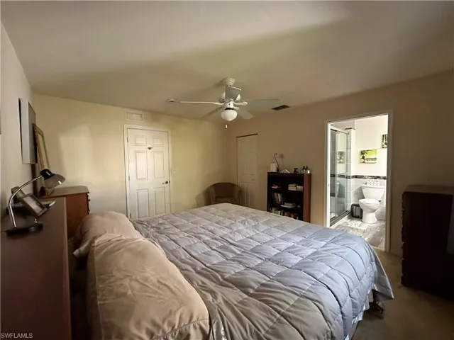 Master Bedroom, ensuite bath, a closet, and ceiling fan