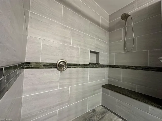 Master Bathroom with tiled shower & Seat