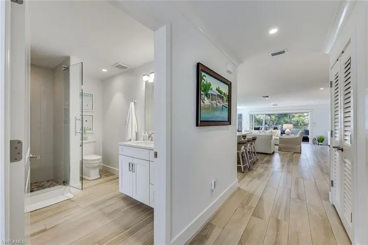 Den ensuite bathroom/powder room as you enter the home.