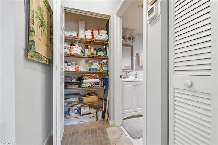 Deep linen and pantry closet in the hall, practical everyday storage