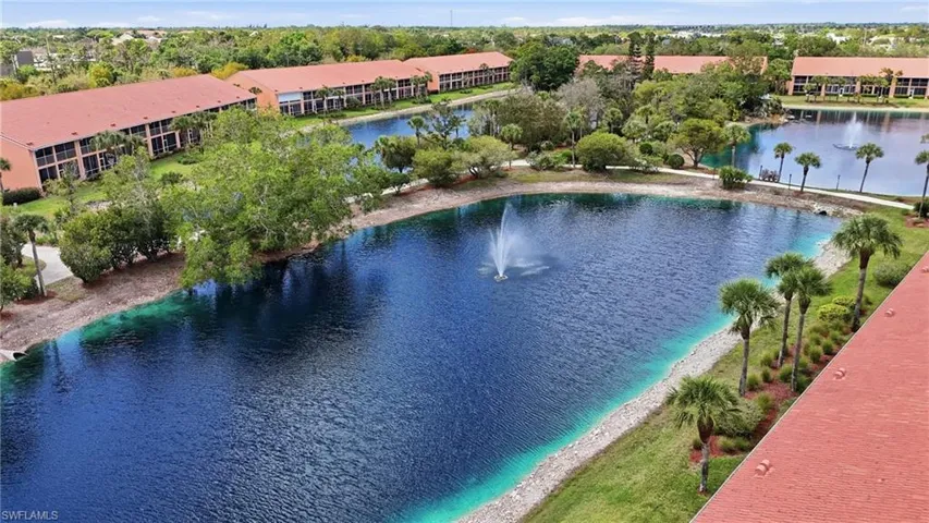 View of pool with a water view