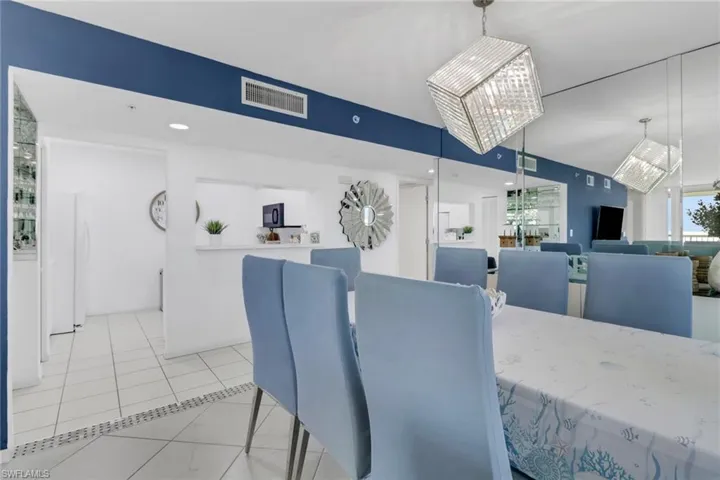 Dining area featuring light tile patterned floors