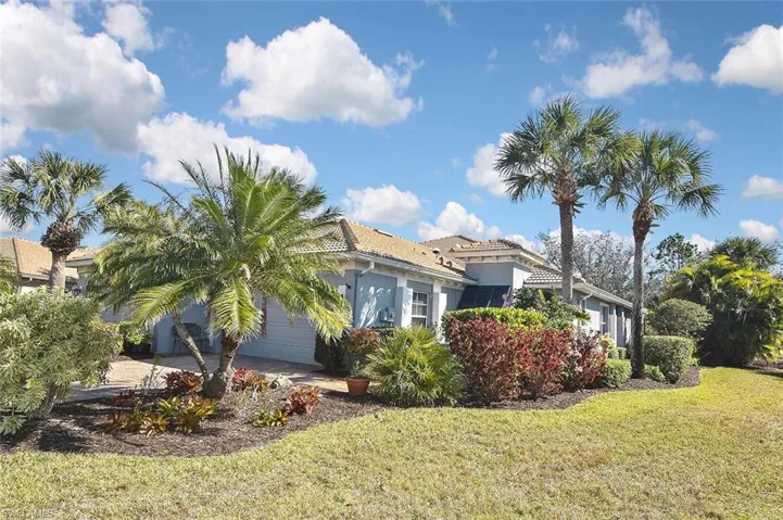 This special home is nestled in a tropical setting
