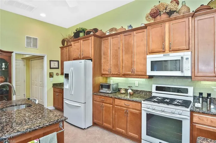 Plenty of storage and counter space here in addition to the prep island with sink