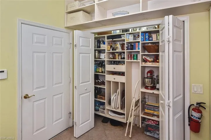 Laundry Room Closet is a perfect Pantry and even has space for special items includes drawers and pull out shelve for heavy items.