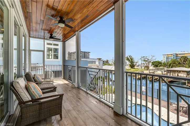 2nd Floor Balcony Overlooking the Pool & Canal