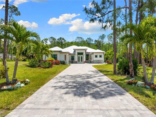 STUNNING 2020 CUSTOM-BUILT LUXURY POOL ESTATE SET ON A SPRAWLING 1.25-ACRE LOT IN BONITA SPRINGS’ COVETED “SAN CARLOS ESTATES!”