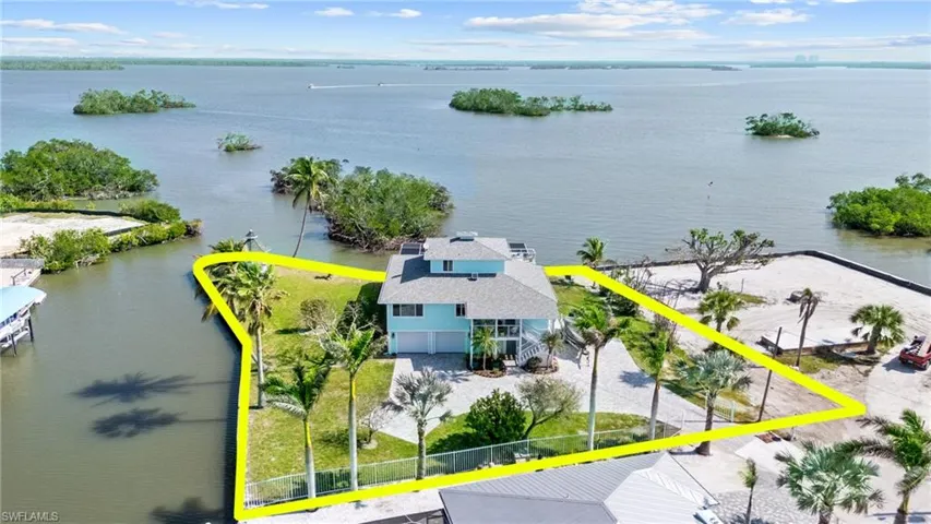 Drone / aerial view featuring a water view /Virtually enhanced