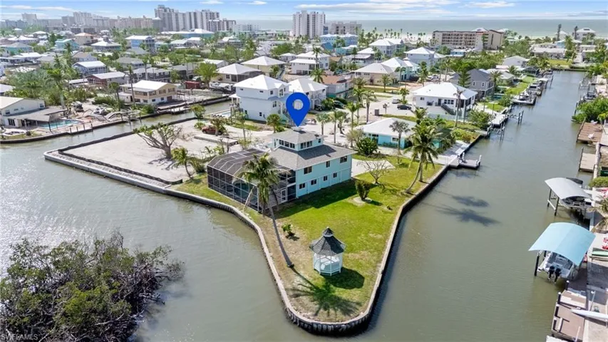 Bird's eye view with a water view VIRTUALLY ENHANCED