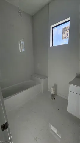 Full bathroom featuring vanity and tub / shower combination