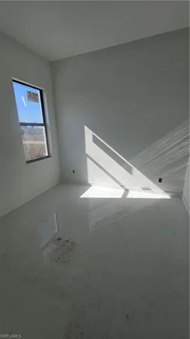 Spare room with baseboards