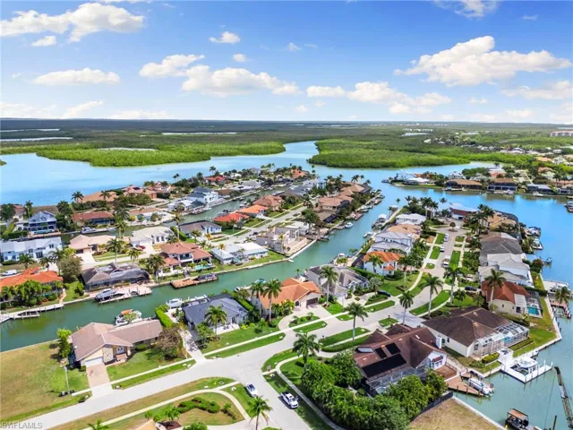 Aerial view of residential area with a nearby body of water
