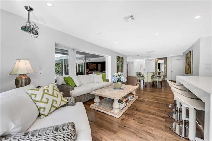 Great room with recessed lighting and hardwood / wood-style floors