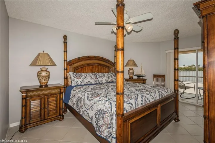 Main bedroom with sliders out to balcony.