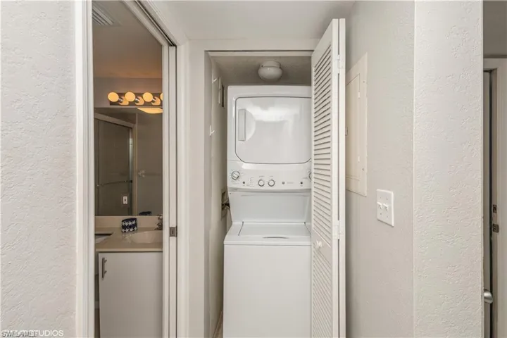 Newer stackable washer/dryer inside the condo.