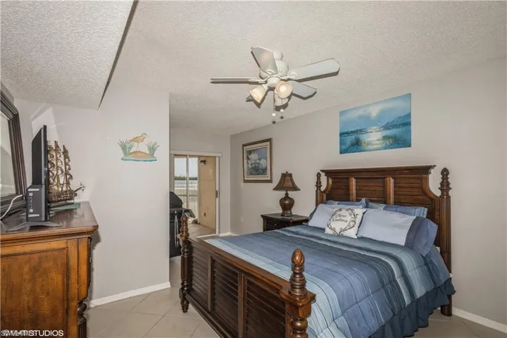Guest bedroom has an alcove that could be used as an office or additional sitting area.