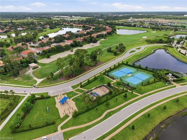 Aerial perspective showcasing a community with extensive green spaces