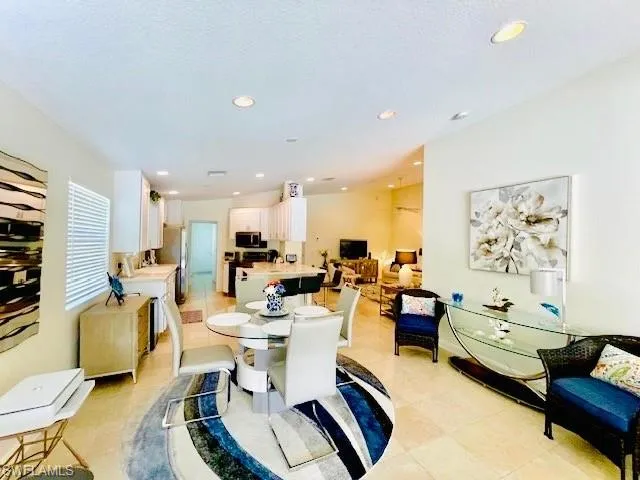 Dining area with a textured ceiling