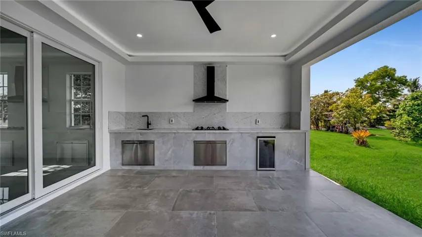 View of patio / terrace with area for grilling and beverage cooler