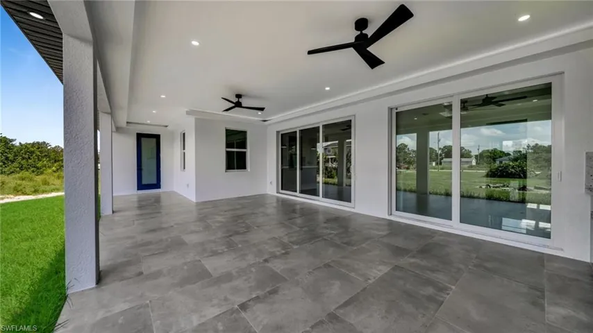 View of patio with ceiling fan