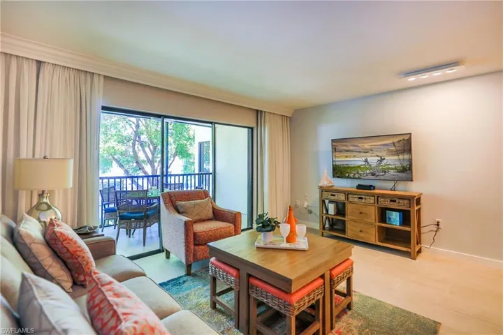 Living room featuring baseboards