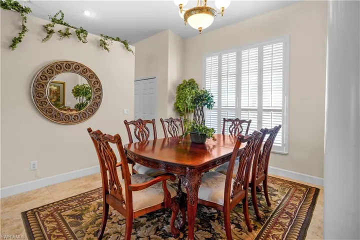Dining room to the right as you enter. Lots of natural light the windows have wooden plantation shutters.