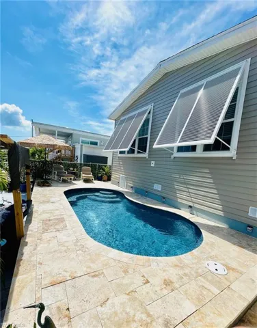 View of pool featuring a patio