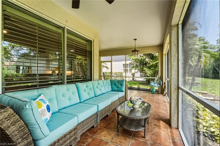 An oversized wraparound lanai bathes the space in sunlight throughout the day.