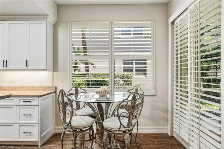 A cozy breakfast nook filled with abundant natural light offers a warm and inviting place to start the day.