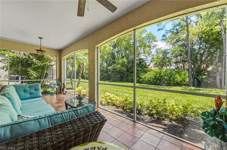 Expansive green space behind the home invites an abundance of natural light into the living areas.