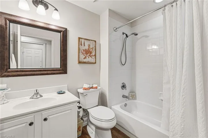 The second full bath includes a single vanity and a shower/tub combination, offering both convenience and functionality.