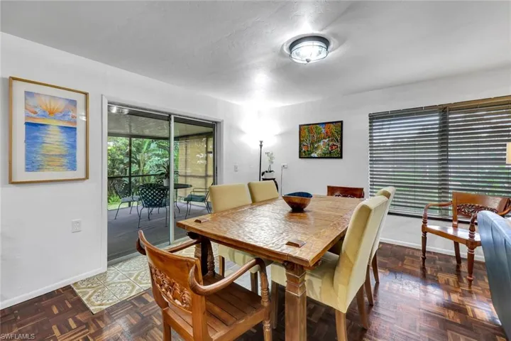 Dining area with entrance to back lanai.