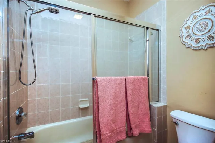 Upstairs guest bath with separate shower/tub area