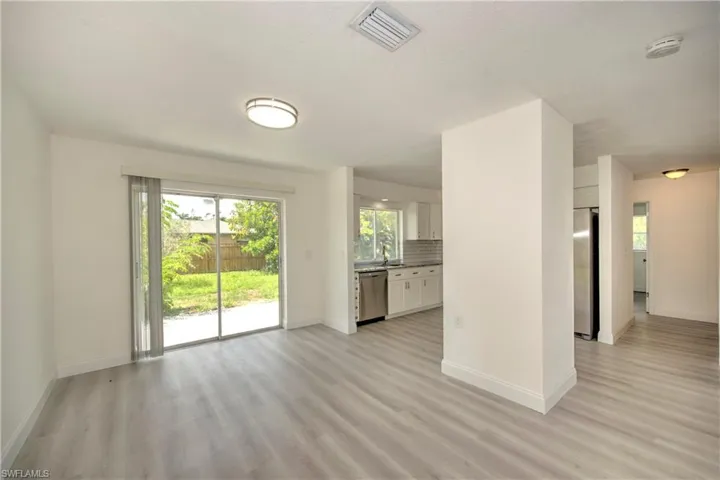 Spare room featuring light hardwood / wood-style floors and sink