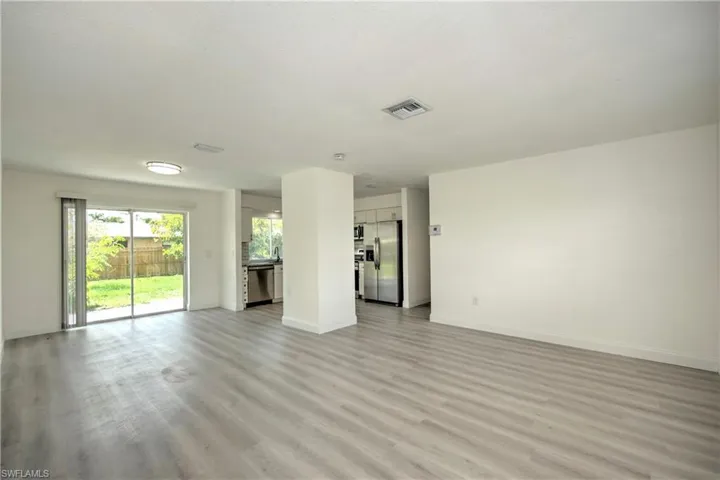Unfurnished living room with light hardwood / wood-style flooring