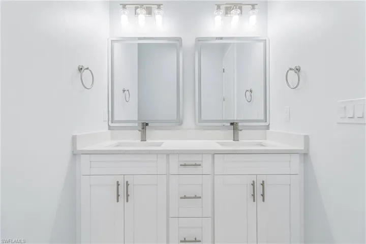 Bathroom featuring double vanity