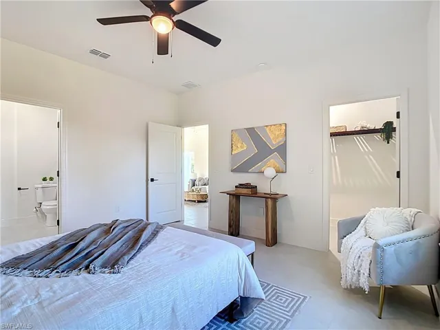Bright interior with light-colored flooring and white walls