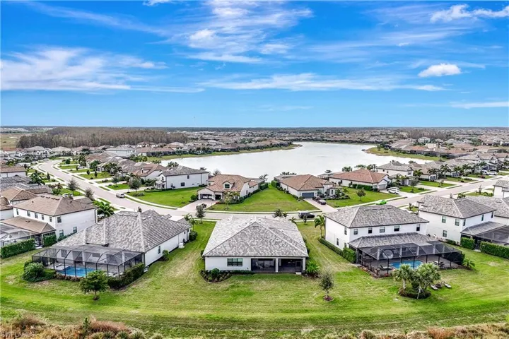 Bird's eye view featuring a water view and a residential view