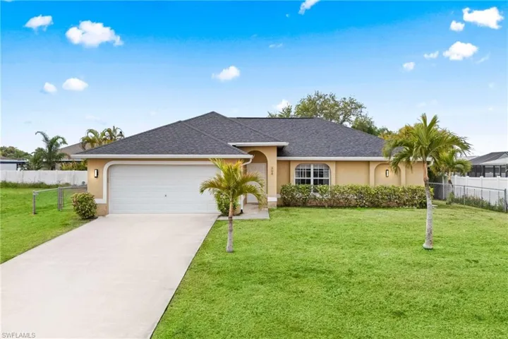 Traditional front with a clear walkway and well-kept lawn.